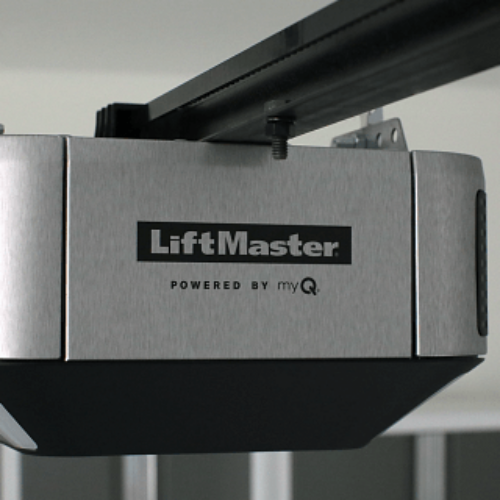 Close-up of a silver and black LiftMaster garage door opener, featuring the 